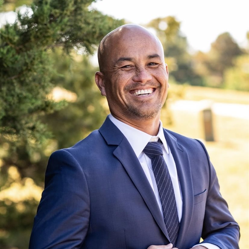 Justin E. Acosta